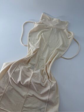 Reformation Maire Knit Sleeveless Mock Neck Open Back Top In Sugar